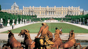 Majestic front view: Versailles Palace's regal facade, an awe-inspiring testament to architectural splendor and history.