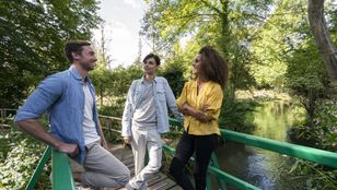 Friends bonding at Giverny: Serene tour filled with laughter and meaningful conversations amidst nature's tranquility.