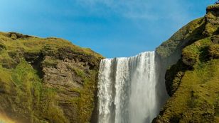 Majestic waterfall in Reykjavik, Iceland, showcasing the natural beauty and enchanting allure of this picturesque destination.