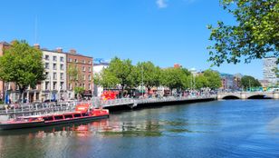 Picturesque Dublin sightseeing cruise, peacefully docked in a corner, offering a gateway to explore the city's charm and maritime allure.