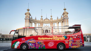 City Sightseeing Palermo Hop-On Hop-Off bus patiently parked, ready to welcome passengers and embark on an adventure through Palermo.