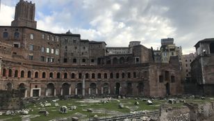 Capturing the grandeur and historical importance, a majestic photo of Trajan's Forum, an ancient Rome landmark, enthralls viewers.