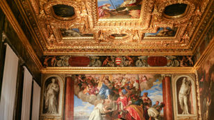 Inside Venice's Doge's Palace, captivating scenes unveil lavish decor, mesmerizing visitors with its exquisite architecture.