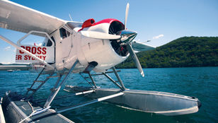 A seaplane poised for takeoff, its wings gleaming in anticipation, as it prepares to embark on a skyward adventure.